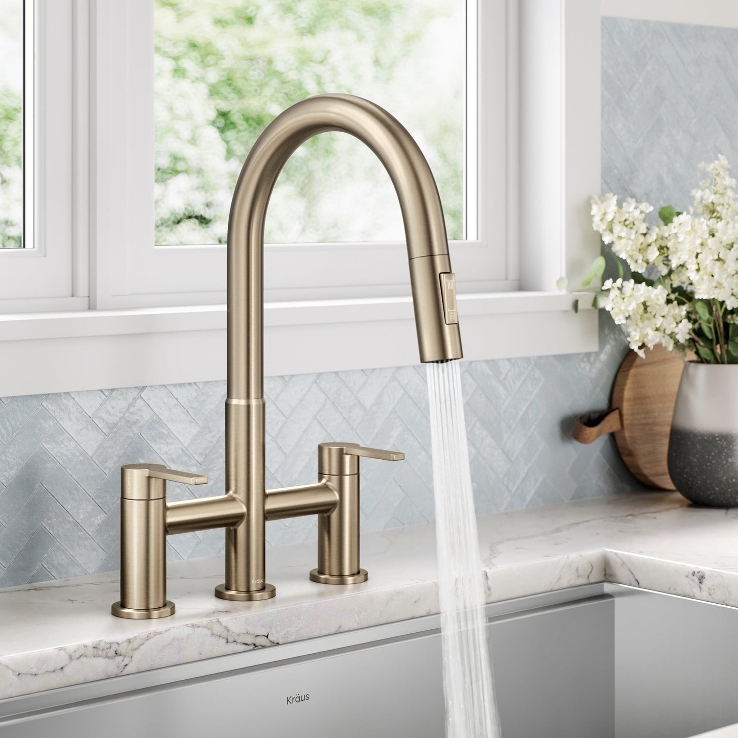 KRAUS Contemporary Bridge Kitchen Faucet with Spray-Head in Antique Bronze - KPF-3122SFACB