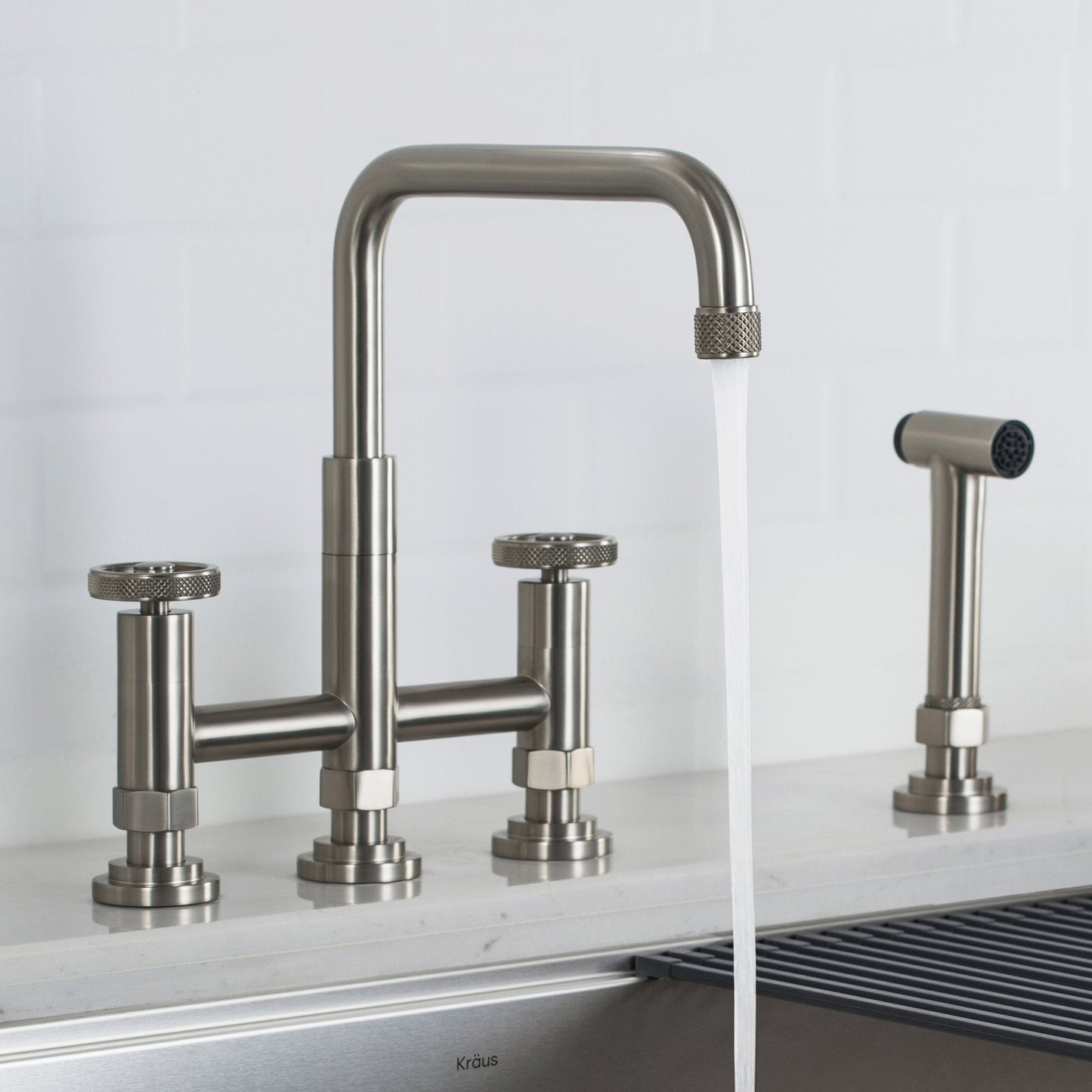 KRAUS Urbix Bridge Kitchen Faucet with Side Sprayer in Spot Free Stainless Steel - KPF-3125SFS